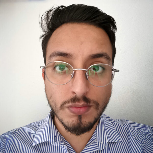 man in glasses and striped shirt