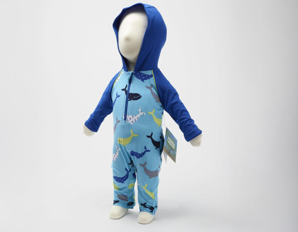 child mannequin with blue hooded swimsuit and whale pattern
