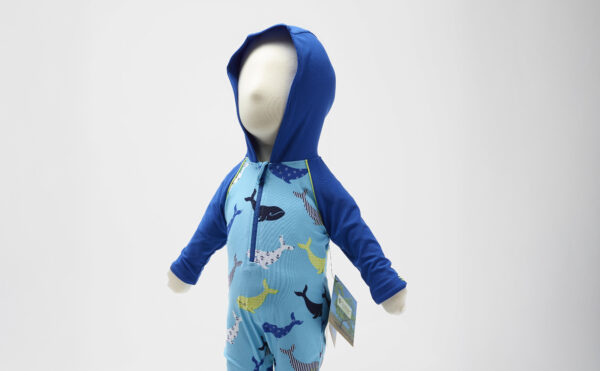 child mannequin with blue hooded swimsuit and whale pattern