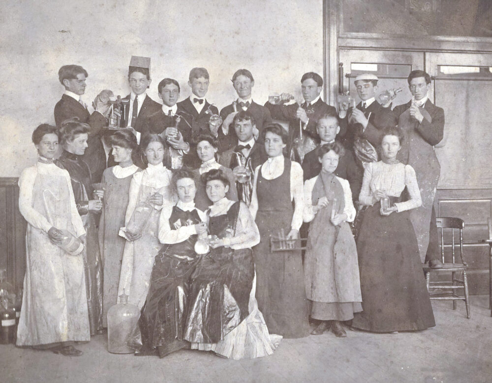 black-and-white photo of assembled students
