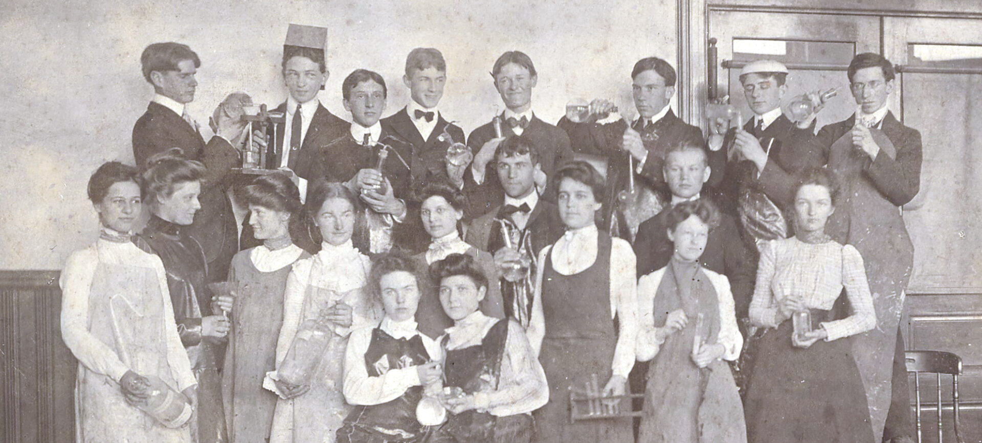 black-and-white photo of assembled students