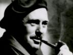 man in a hat smoking a pipe