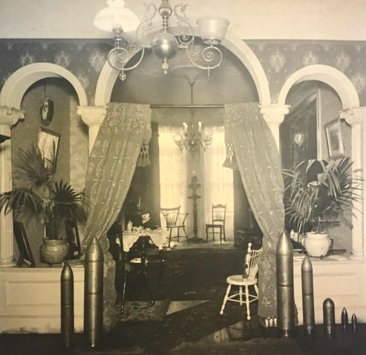 black and white photo of missiles lined up in a living room