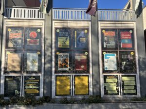 building windows covered in images of Microbe Hunters book jackets