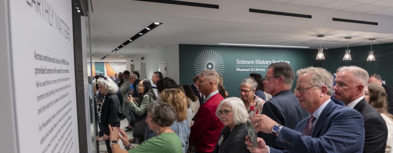 large group pf people looking at an exhibit