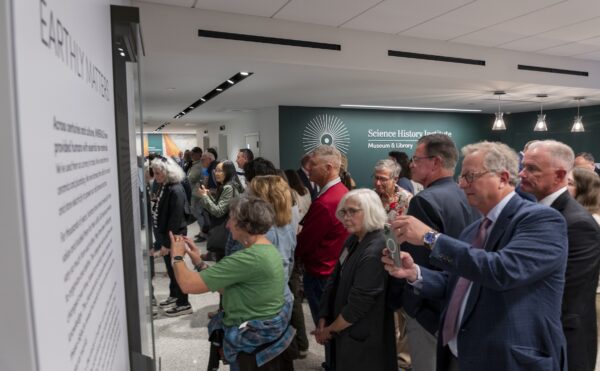 large group pf people looking at an exhibit