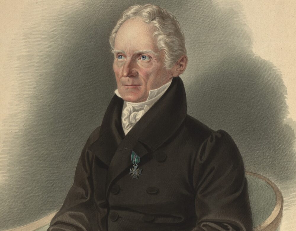 color portrait of a man sitting in a chair