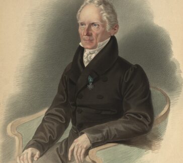 color portrait of a man sitting in a chair