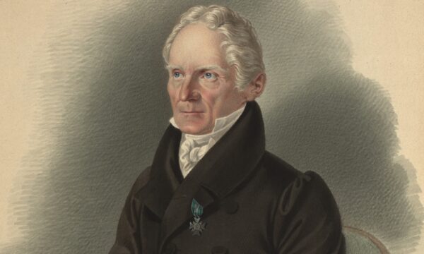 color portrait of a man sitting in a chair