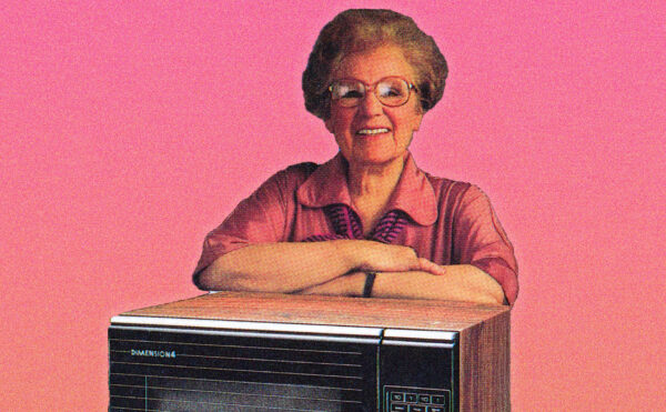 Photo of an older woman, posed on a microwave oven