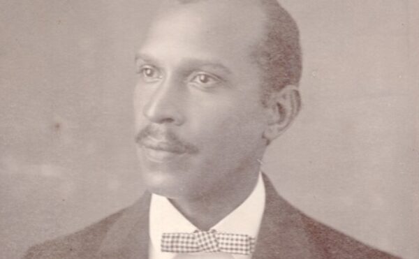 black and white portrait of a man wearing a bowtie