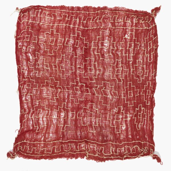 Photograph of a red cloth on a white background