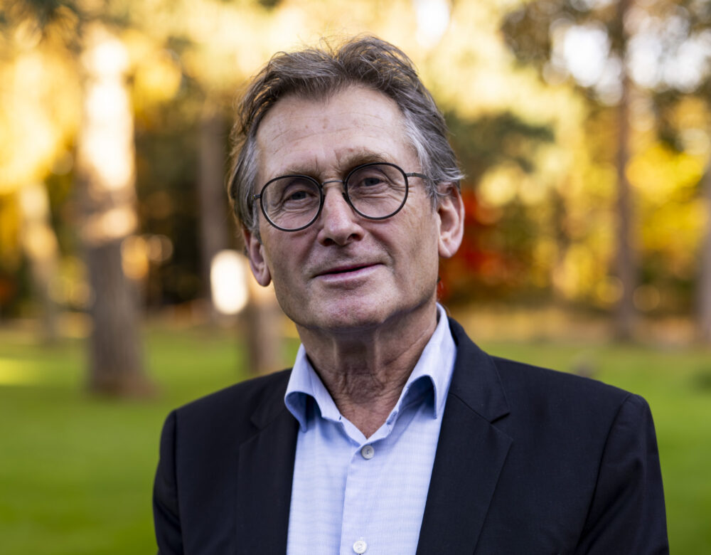 outdoor photo of Ben Feringa in a shirt and blazer