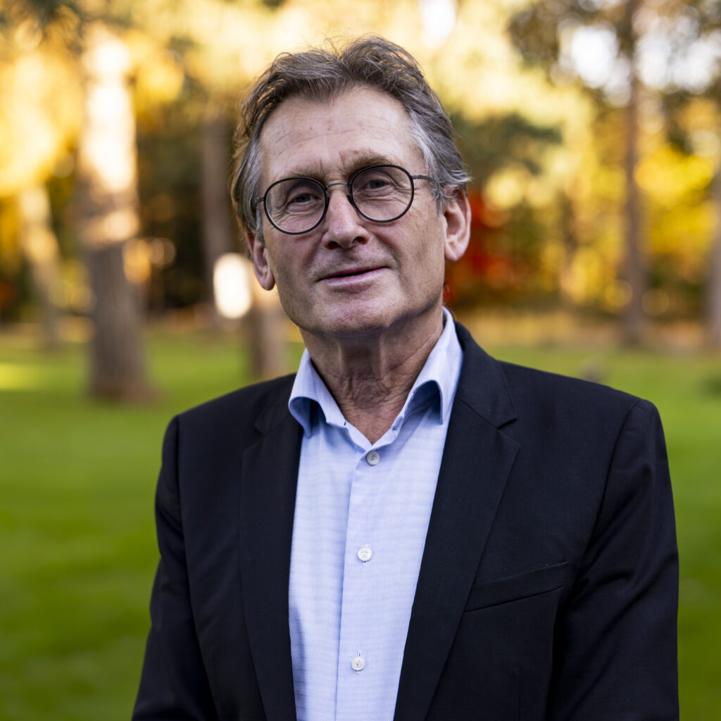 outdoor photo of Ben Feringa in a shirt and blazer