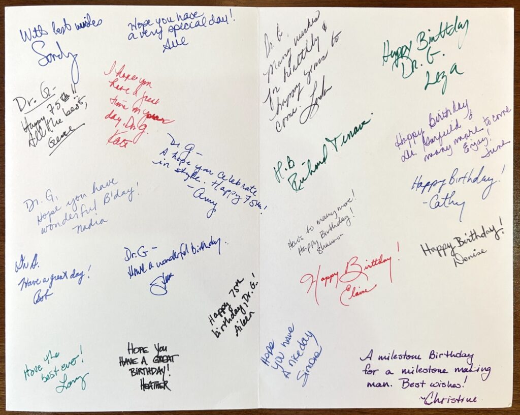 Group card for Eugene Garfield signed by ISI staff