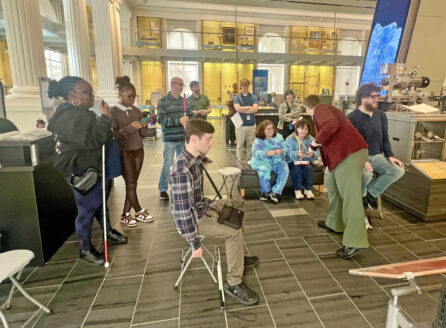 guests and guides gathered near Object Explorer for touch tour