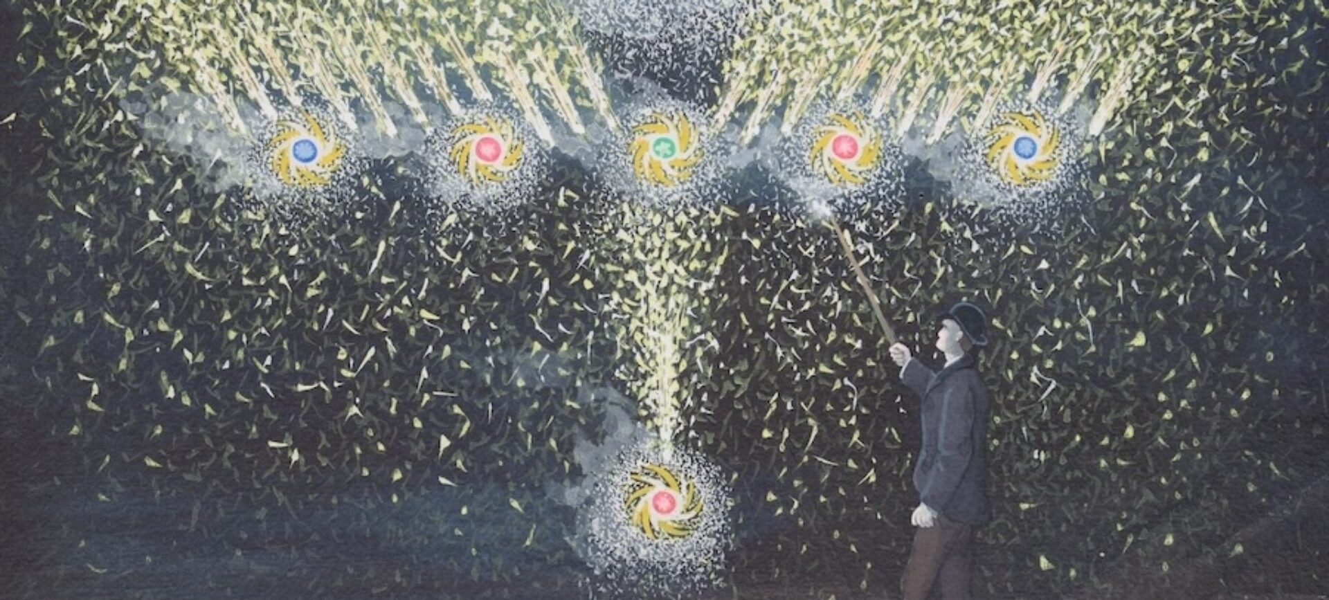 A colorful firework display with a person using a stick to ignite them, illustrating the history of fireworks.