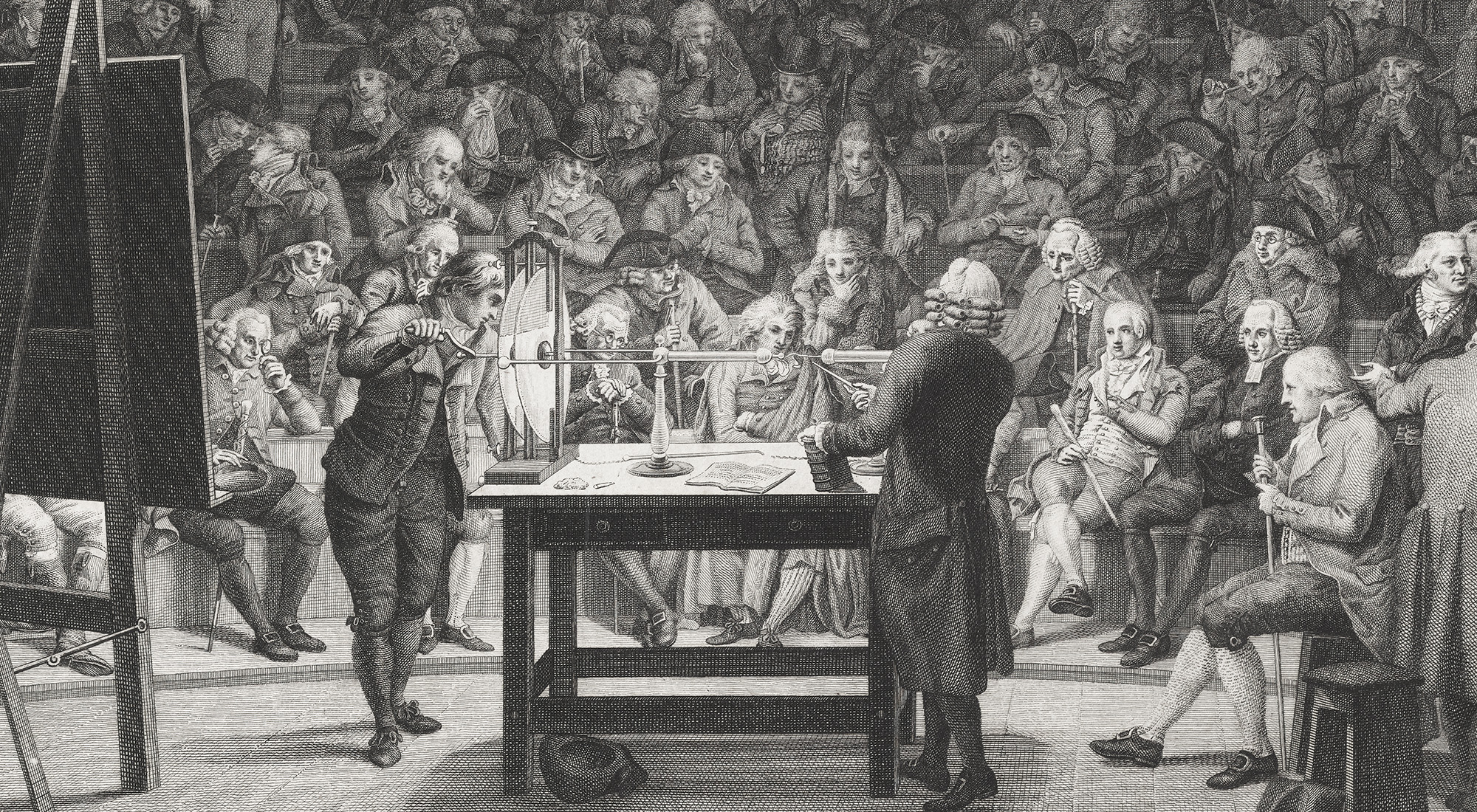 Illustration of two men operating an electrostatic generator in front of a crowd in a lecture hall