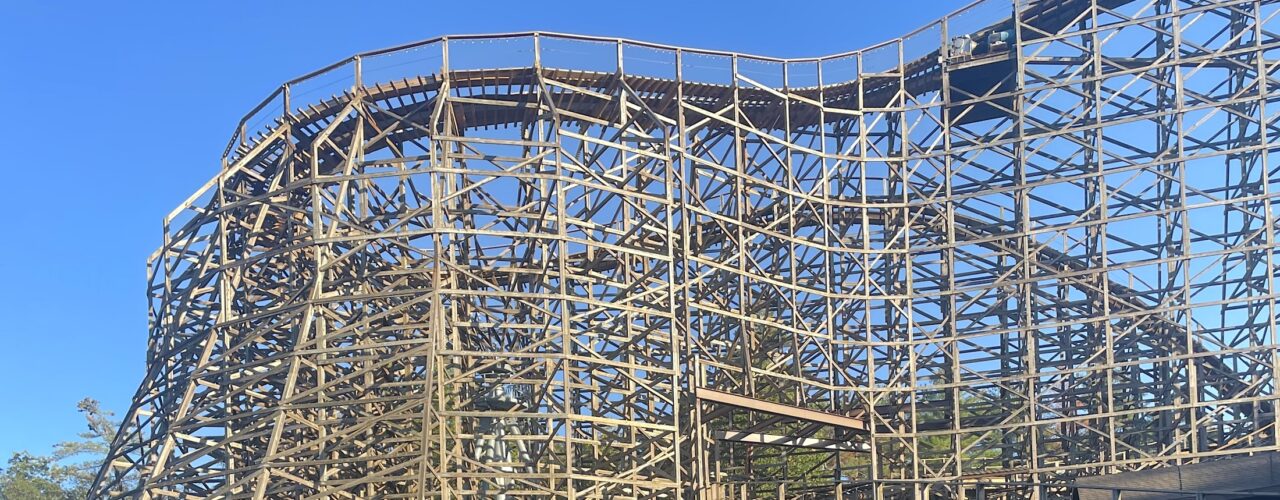 photo of a tall wooden roller coaster