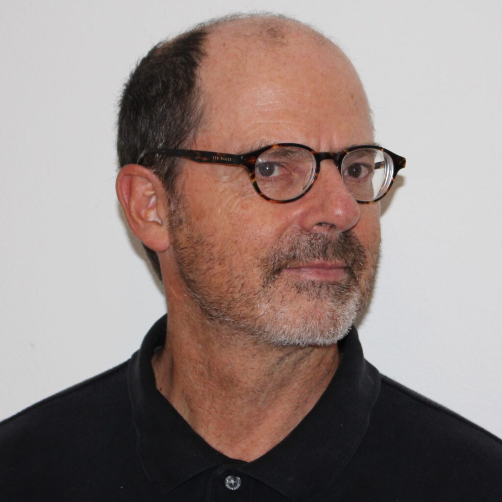 photo of a man with a goatee and glasses
