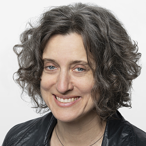 studio portait of Donna Bilak in a leather jacket
