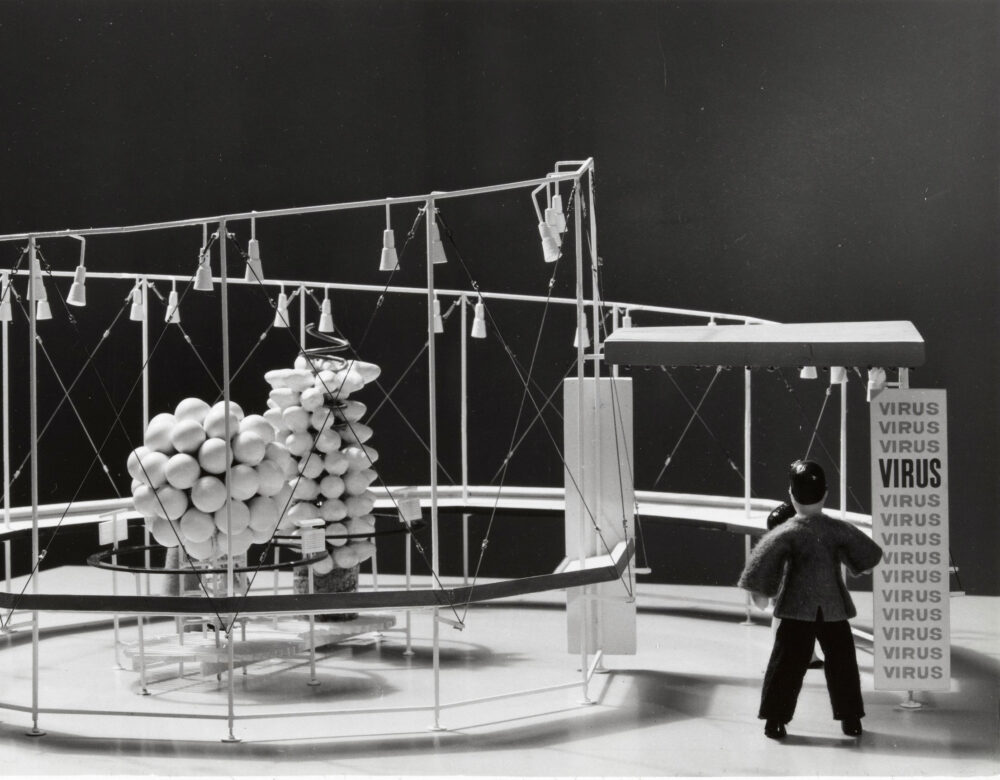 black and white photo of world's fair display of virus structure model