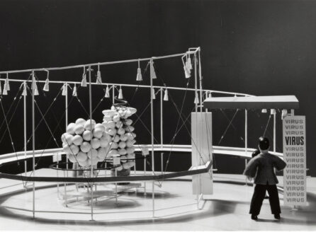 black and white photo of world's fair display of virus structure model