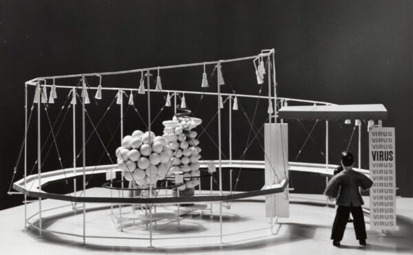 black and white photo of world's fair display of virus structure model