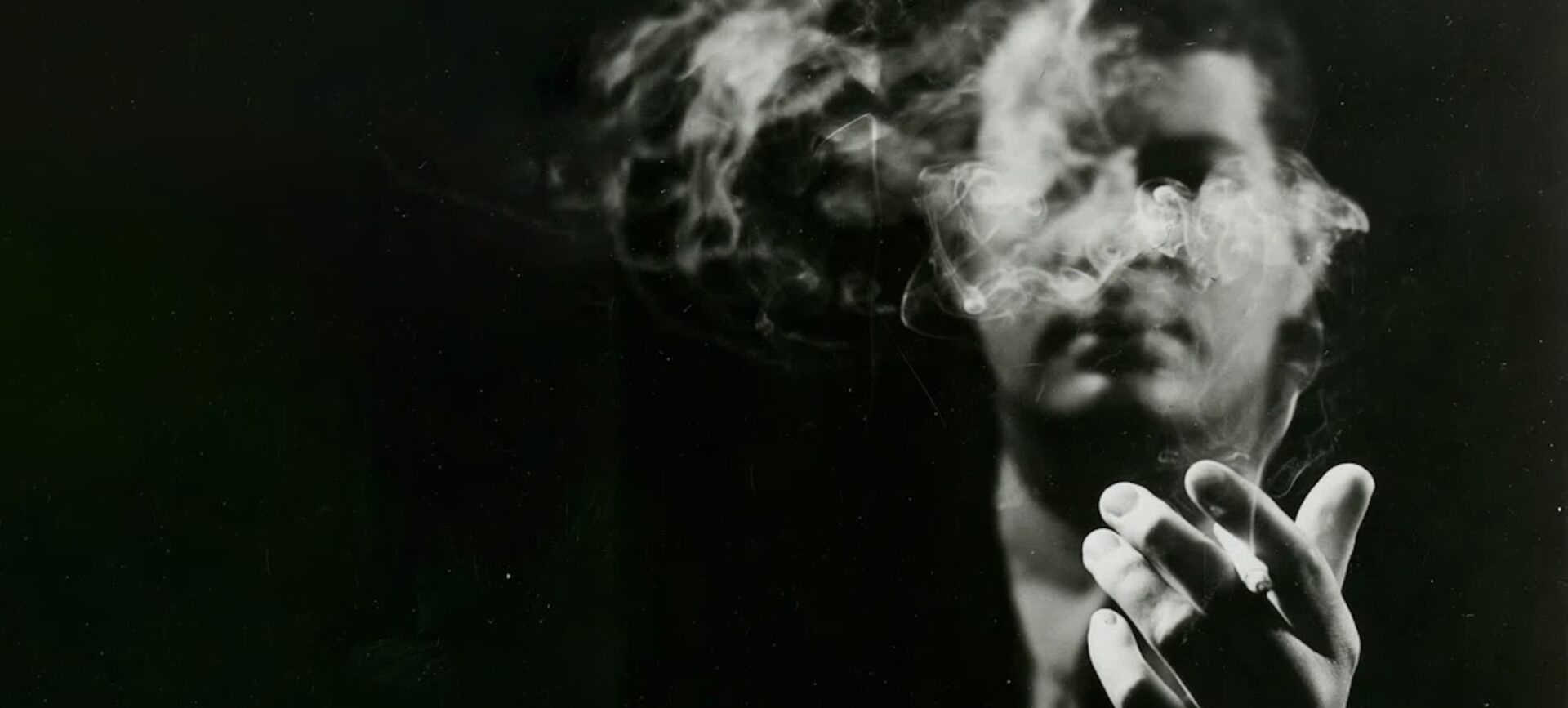 image of a man smoking a cigarette