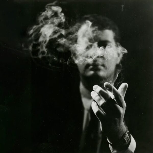 image of a man smoking a cigarette
