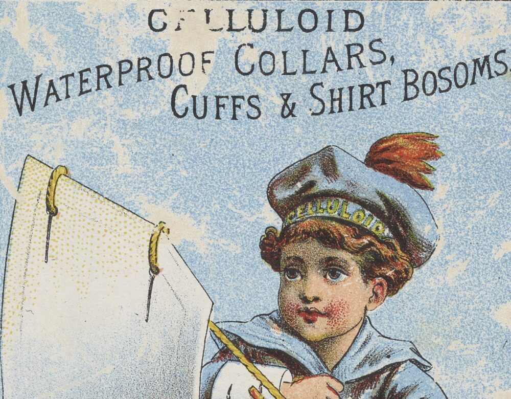 Trade card for waterproof celluloid collars, cuffs, and shirt bosoms depicts a boy sailing on a cuff