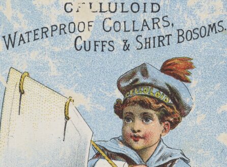 Trade card for waterproof celluloid collars, cuffs, and shirt bosoms depicts a boy sailing on a cuff