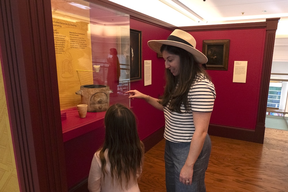 People looking at a museum display