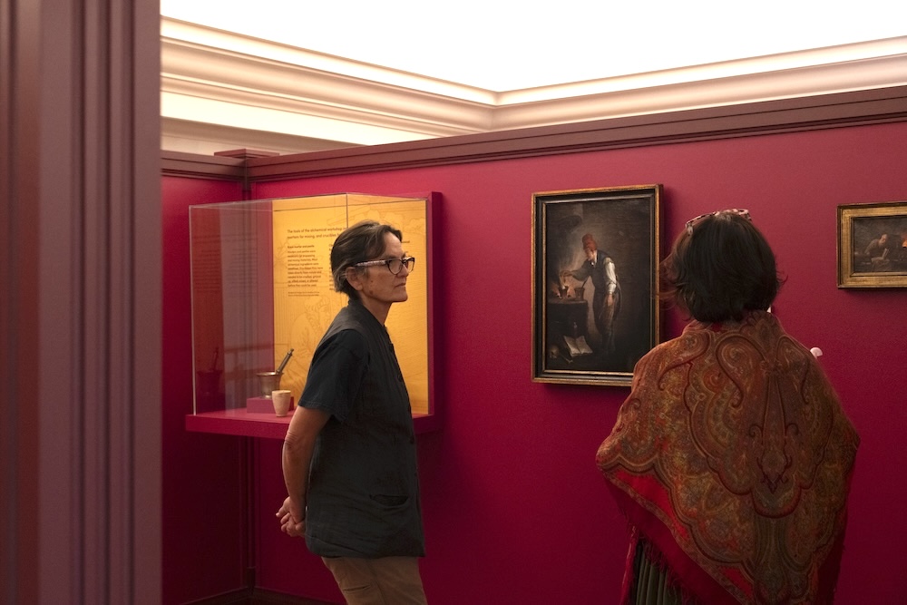 People looking at a museum display
