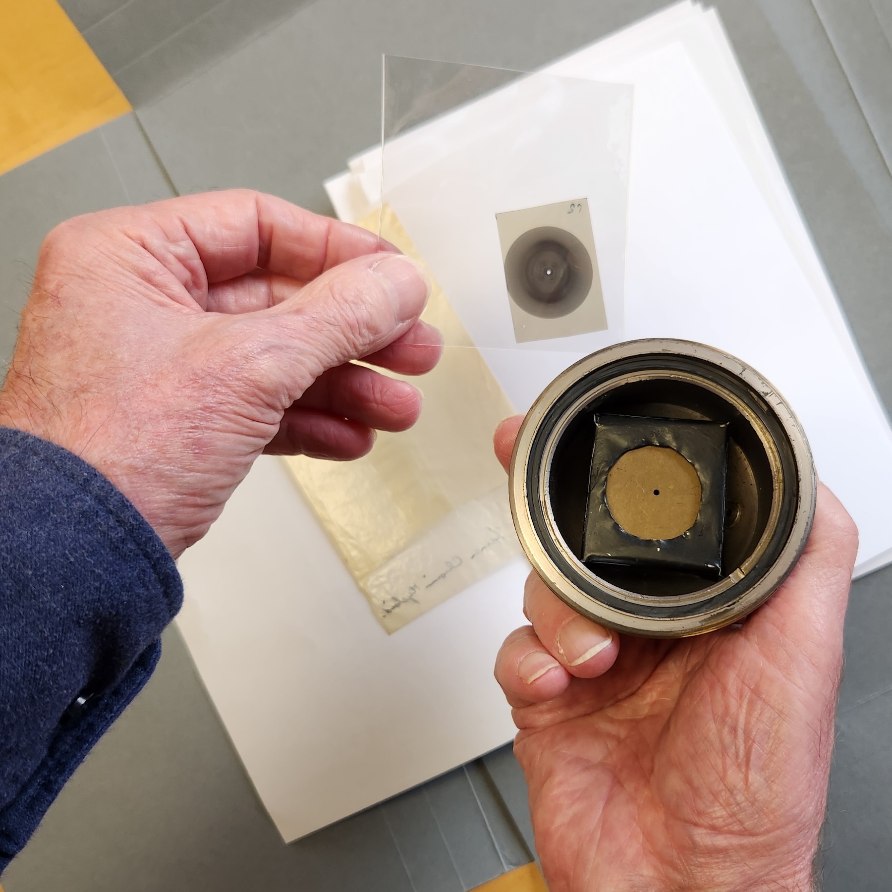 researcher studying an x-ray camera